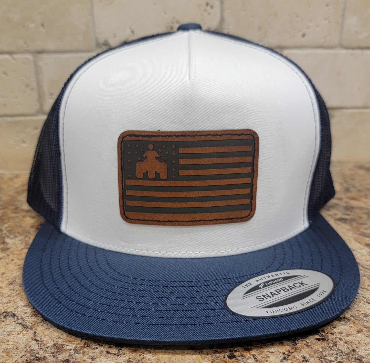 Threewheeler Leather Patch Flat Bill Trucker Hat