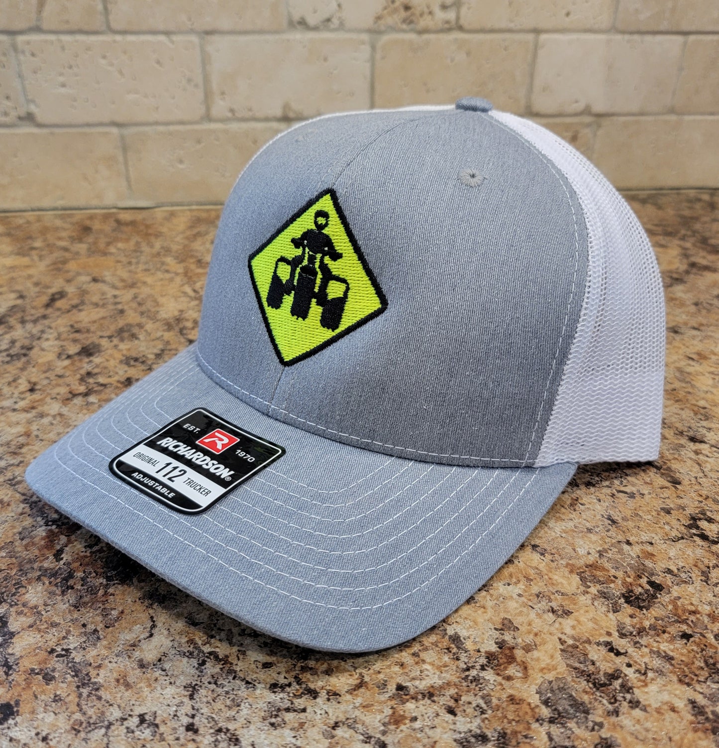 Neon Threewheeler Street Sign Richardson 112 Trucker Hat