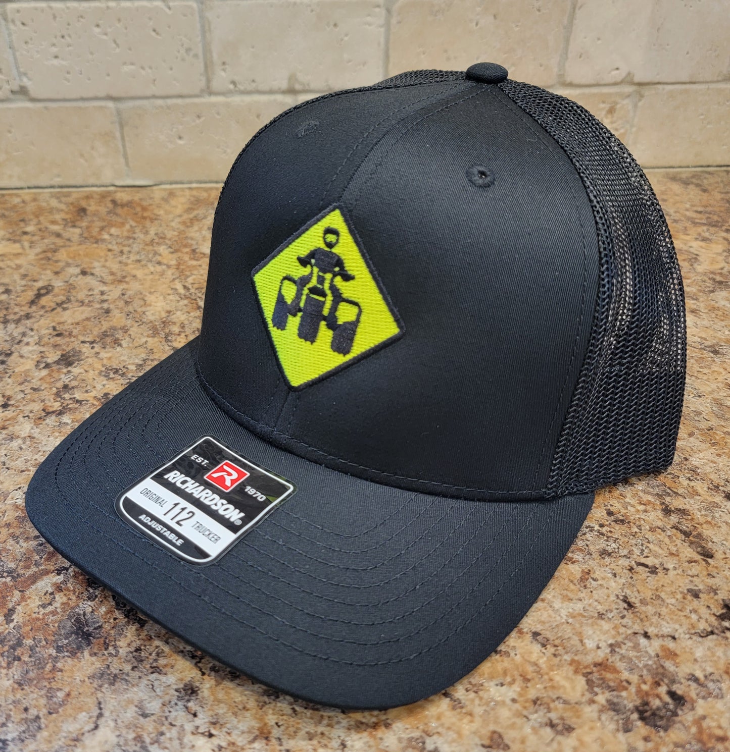 Neon Threewheeler Street Sign Richardson 112 Trucker Hat