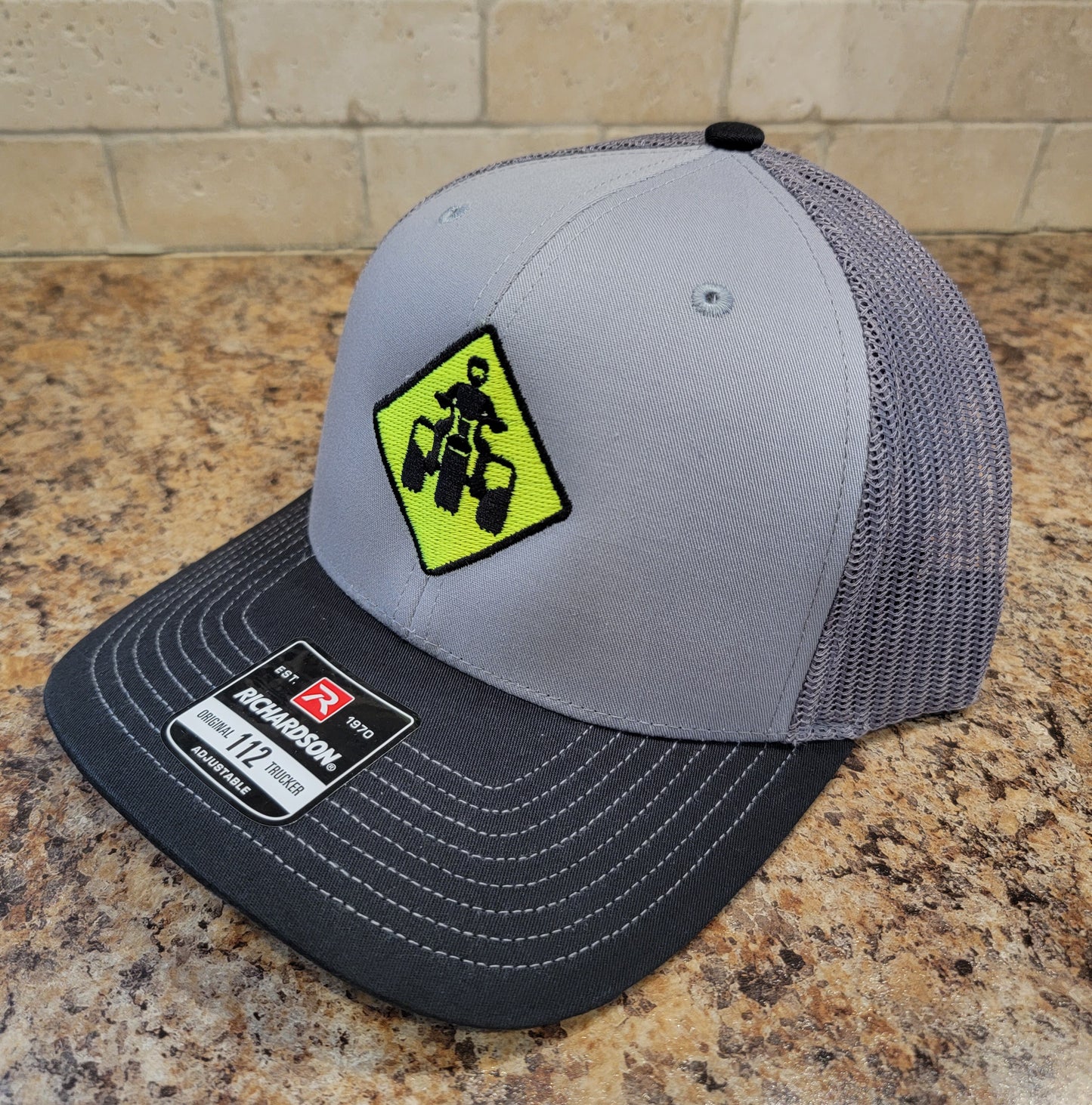 Neon Threewheeler Street Sign Richardson 112 Trucker Hat